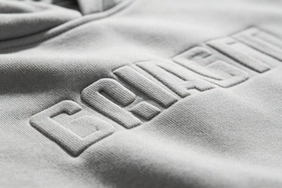 Embossed logo application for premium apparel collections